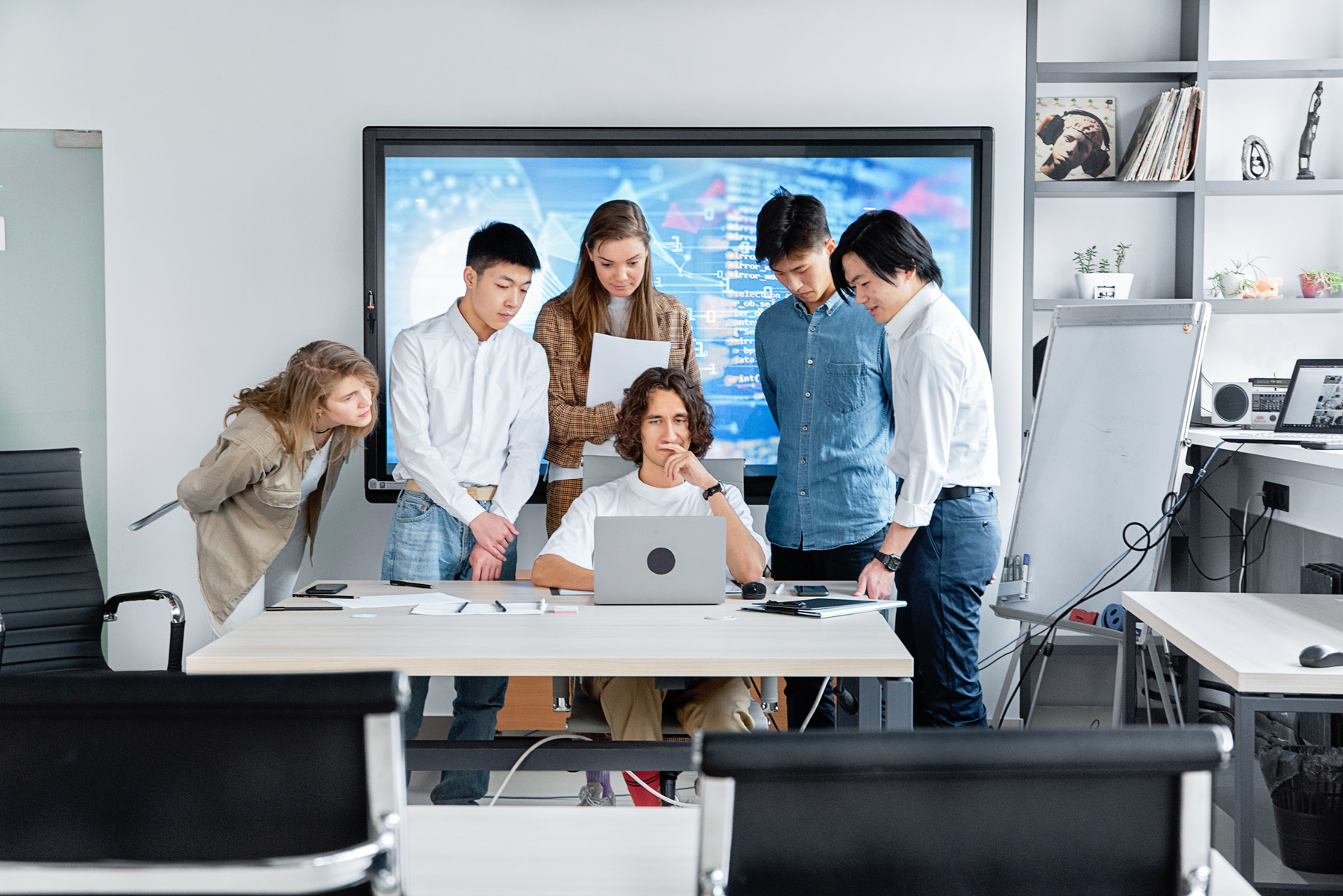 People Looking at the Laptop Screen 